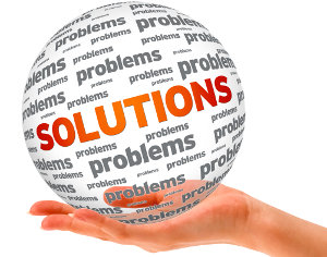 Hand holding a Solutions 3D Sphere sign on white background.